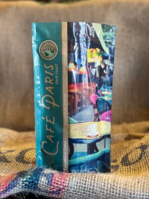 Café Paris Dark Roast coffee, full bag on counter