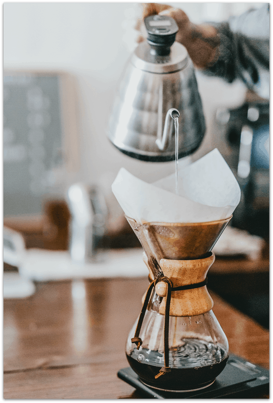 Hario kettle pouring into a chemex cofffee pourover