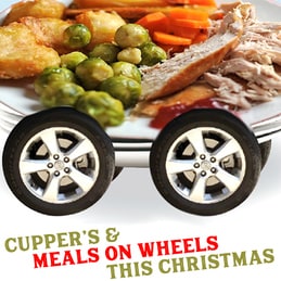 Cupper's Meals on Wheels, with a hot dinner on a plate on a pair of wheels.