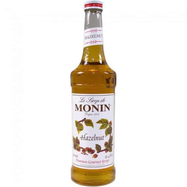 monin hazelnut syrup in glass bottle