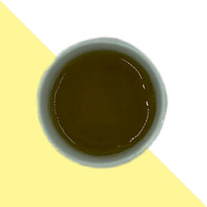 cup of yellow tea, top down view