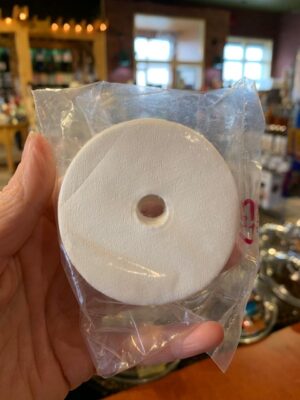 Bag of bellman paper filters being held by a hand