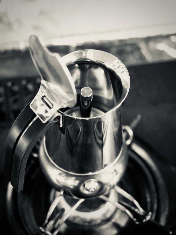 black and white top view of a Bialetti Moka Pot