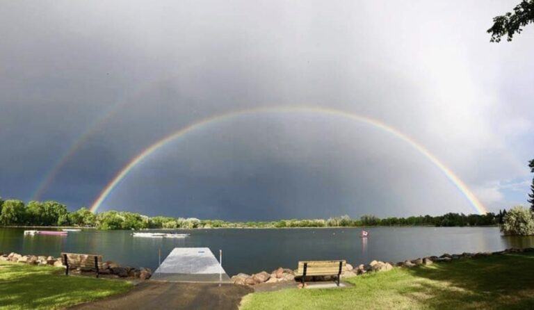 double rainbow over dragon boats at Henderson Lake