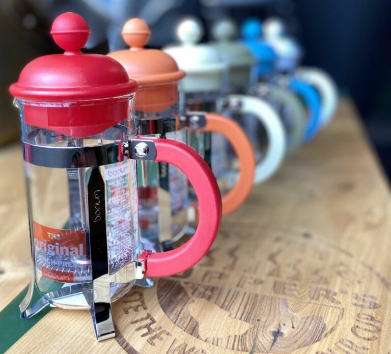 Rainbow row of small French presses