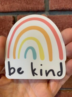 vinyl sticker of a childish rainbow with words be kind