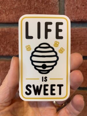 vinyl sticker of a beehive and words life is sweet
