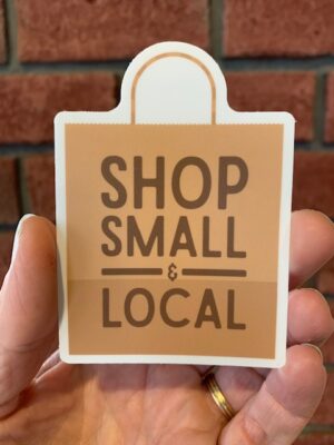 vinyl sticker of a brown paper bag with words shop small & local