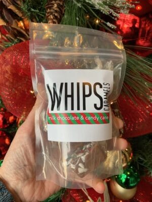 A bag of whips candy cane sprinkled caramels