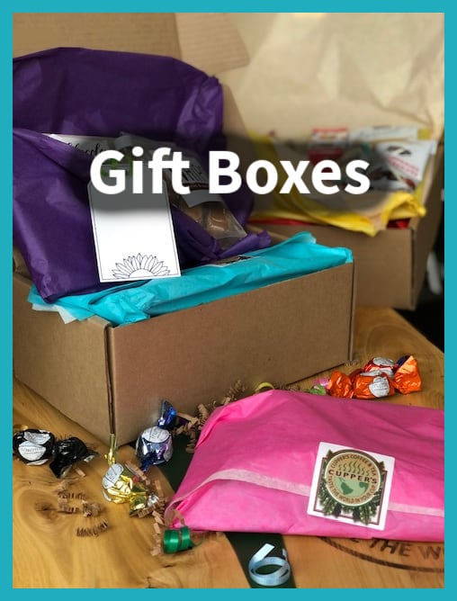 Gift box with individual presents wrapped in tissue