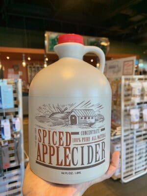 a jug of spiced apple cider concentrate at Cupper's