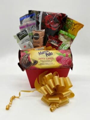 Valentine's Basket small, with coffee, tea and assorted goodies in a red basket with a gold bow