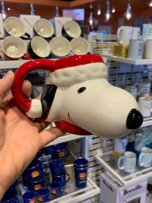 Peanut's Snoopy's head wearing a Santa hat, as a coffee mug