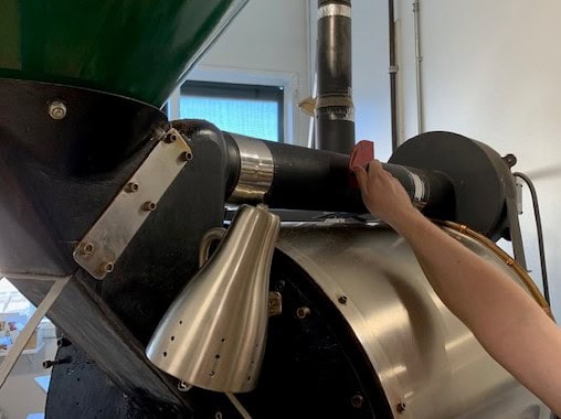 The venting tubes on the top of the coffee roaster