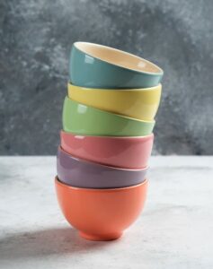 A stack of colourful cupping bowls