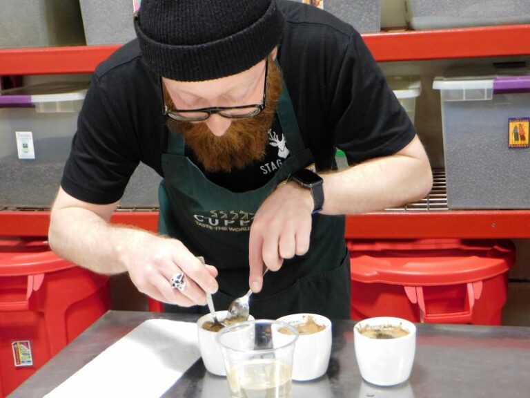 Mickey separating his coffee grounds for coffee cupping tasting