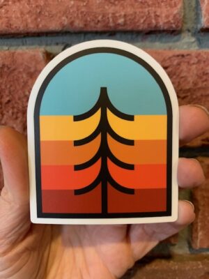 sticker tree crest on a multicoloured background