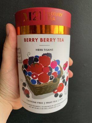 M21 Berry Berry tea being held by a hand