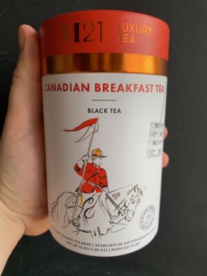 M21 Canadian Breakfast Tea being held by a hand