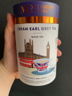 M21 Cream Earl Grey Tea being held by a hand