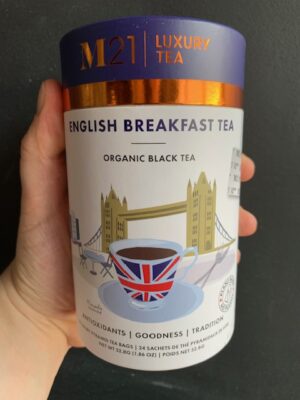 M21 English Breakfast Tea being held by a hand