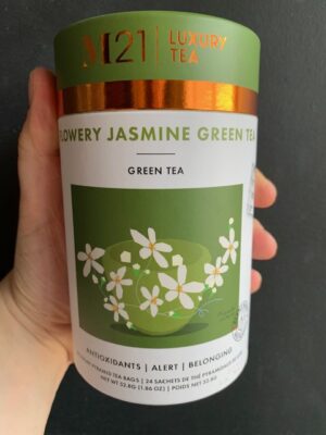 M21 Flowery Jasmine Green Tea being held by a hand