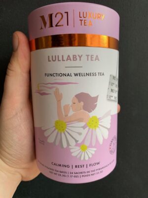 M21 Lullaby Tea being held by a hand