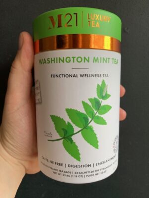 M21 Washington Mint Tea being held by a hand