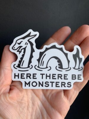 Sticker in black and white with a water dragon and text 'here there be monsters'