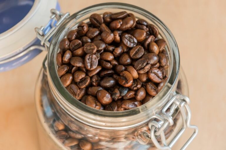 Top view of coffee beans stored in a clampable mason jar