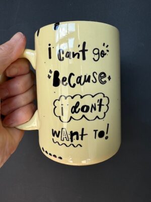 Prairie Chick Mug in light yellow with "I can't go because I don't want to."
