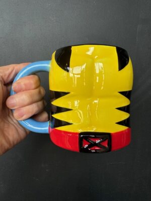 Marvel X-Men Wolverine suit mug, featuring his yellow suit with red belt.