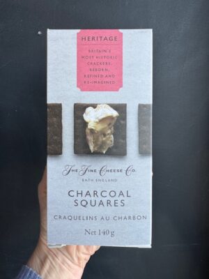 A box of Fine Cheese Co. Heritage Squares charcoal crackers