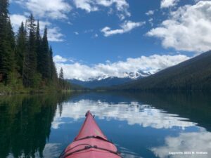 Kayak on Bowron Lakes by Nancy Graham