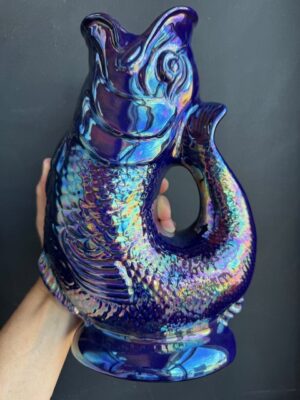 Cobalt blue lustre XL Gluggle Jug in front of a black wall