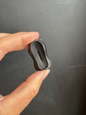 Food crayon sharpener in front of a black background