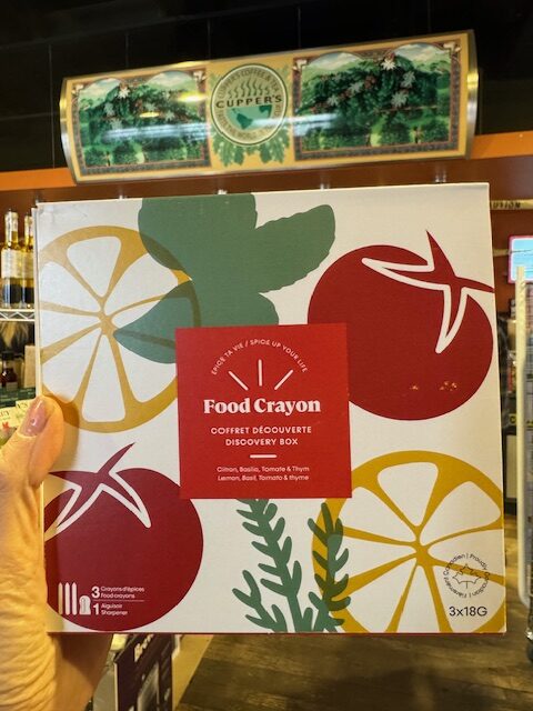 Food crayon discovery gift box, with a lemon, a basil and a turmeric/thyme crayon and a sharpener in bright red box