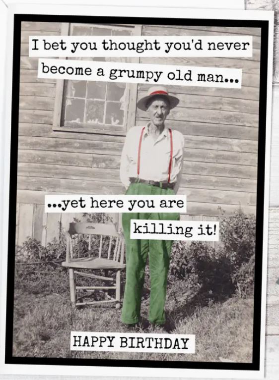 Raven's Rest Studio Greeting Card - "I bet you thought you'd never become a grumpy old man... yet here you are killing it. Happy Birthday!" With an old man in suspenders in front of a wooden building.