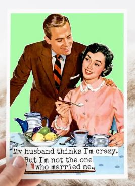 Raven's Rest Studio Greeting Card - "My husband thinks I'm crazy. But I'm not the one who married me." 1050's couple at a table of food.