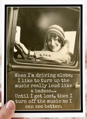Raven's Rest Studio Greeting Card - "When I'm driving alone, I like to turn up the music really loud like a badass... Until I get lost, then I turn off the music so I can see better." Vintage woman driving an old car.