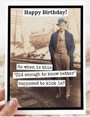 Raven's Rest Studio Greeting Card -"Happy Birthday! So when is this 'old enough to know better' supposed to kick in?" Vintage man standing in front of a clapboard house in the snow.