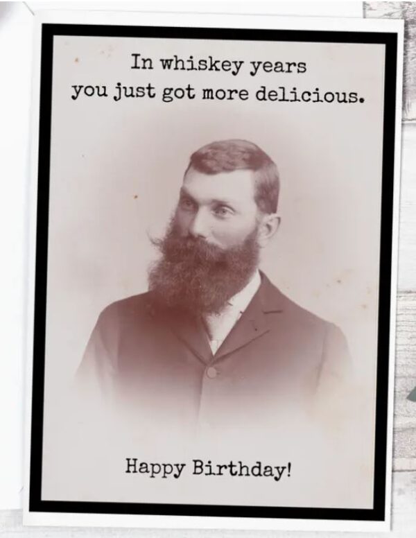 Raven's Rest Studio Greeting Card - 'In whiskey years, you just got more delicious.' Birthday card. Portrait bust of a gentleman with large beard and moustache.