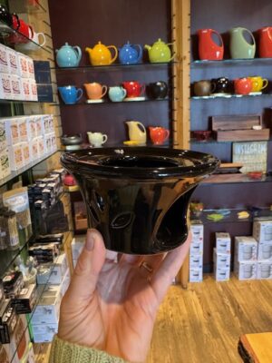 Teapot warmer made of black ceramic