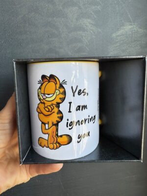 Boxed white Garfield the Cat Mug with text 'Yes, I am ignoring you.'