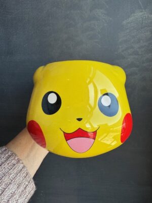 Large mug of Pokémon's Pikachu head smiling from the front