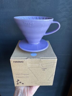 Hario V60 ceramic coffee pourover in Purple Heather, on its box