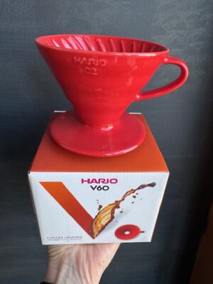 Hario V60 ceramic coffee pourover in Red, on its box