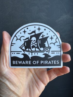 Black & white vinyl sticker with pirate ship, and text 'Beware of Pirates"