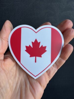 heart shaped sticker with Canada Flag and on it