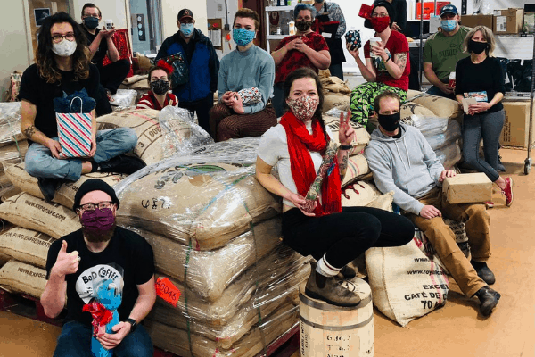Independent Coffee Roasters Cupper's Coffee staff at Christmas in the back of the store
